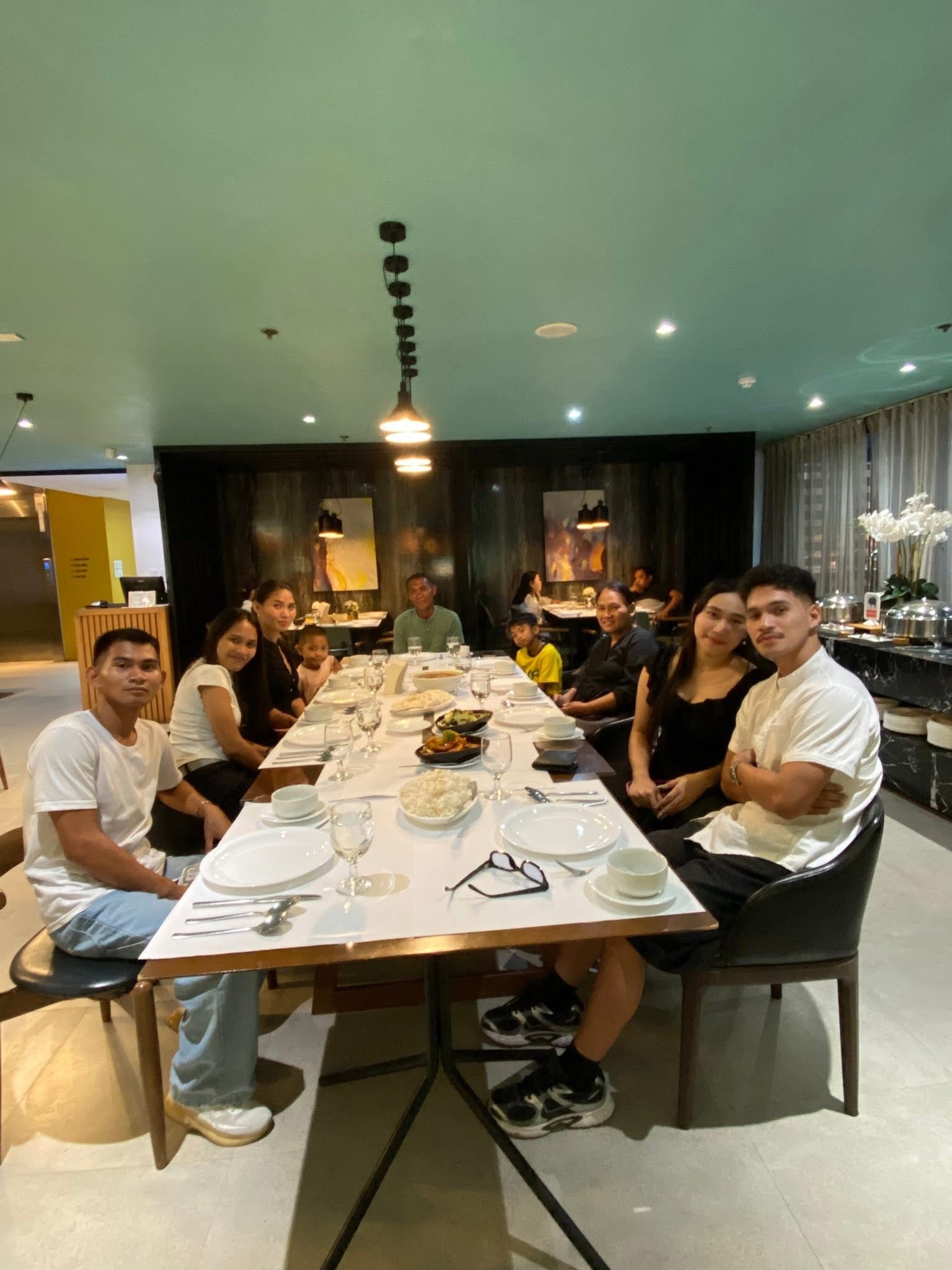 Andrew's family gathered at dinner